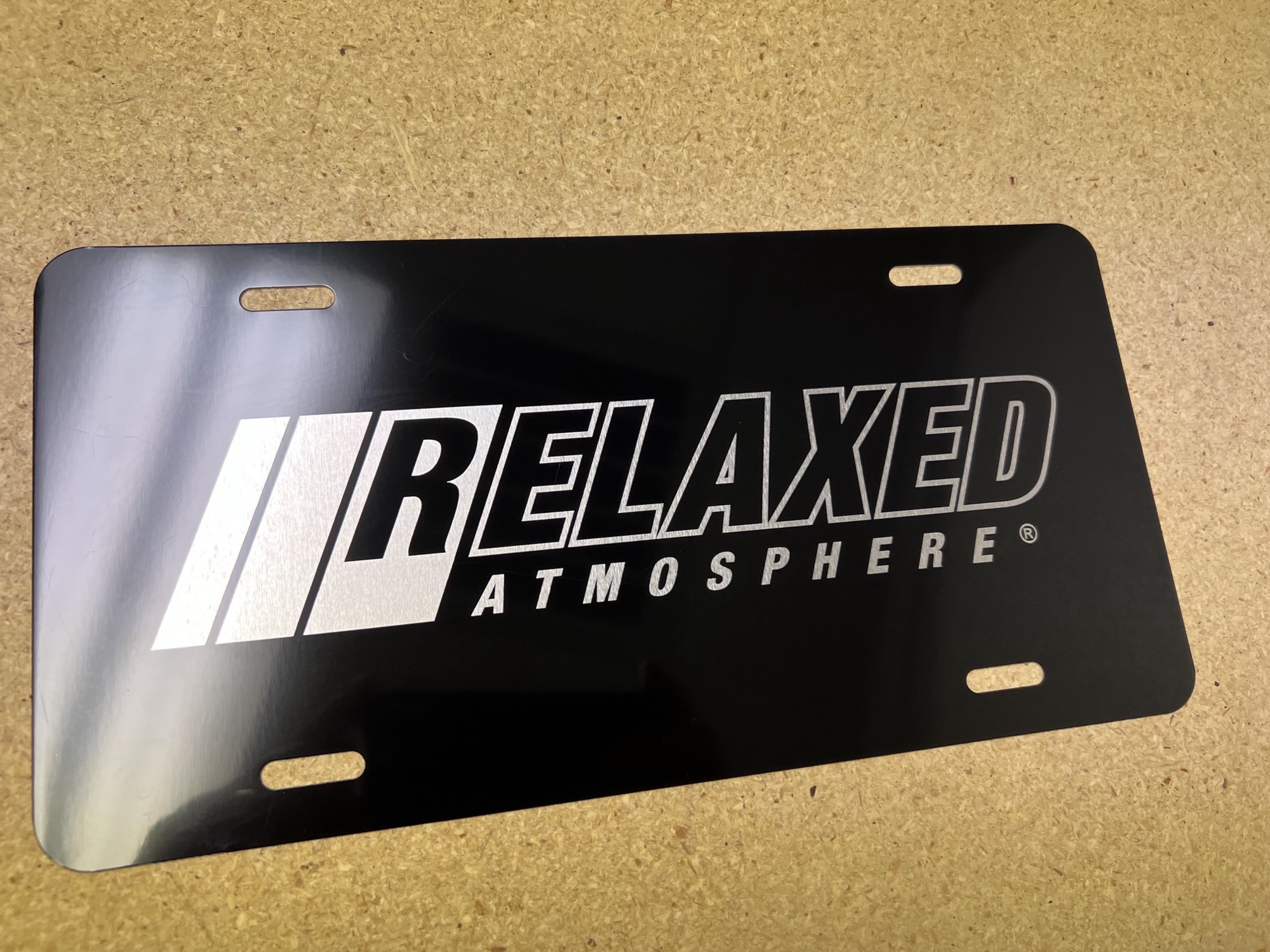 Relaxed Atmosphere - Stainless Steel License Plate - Black